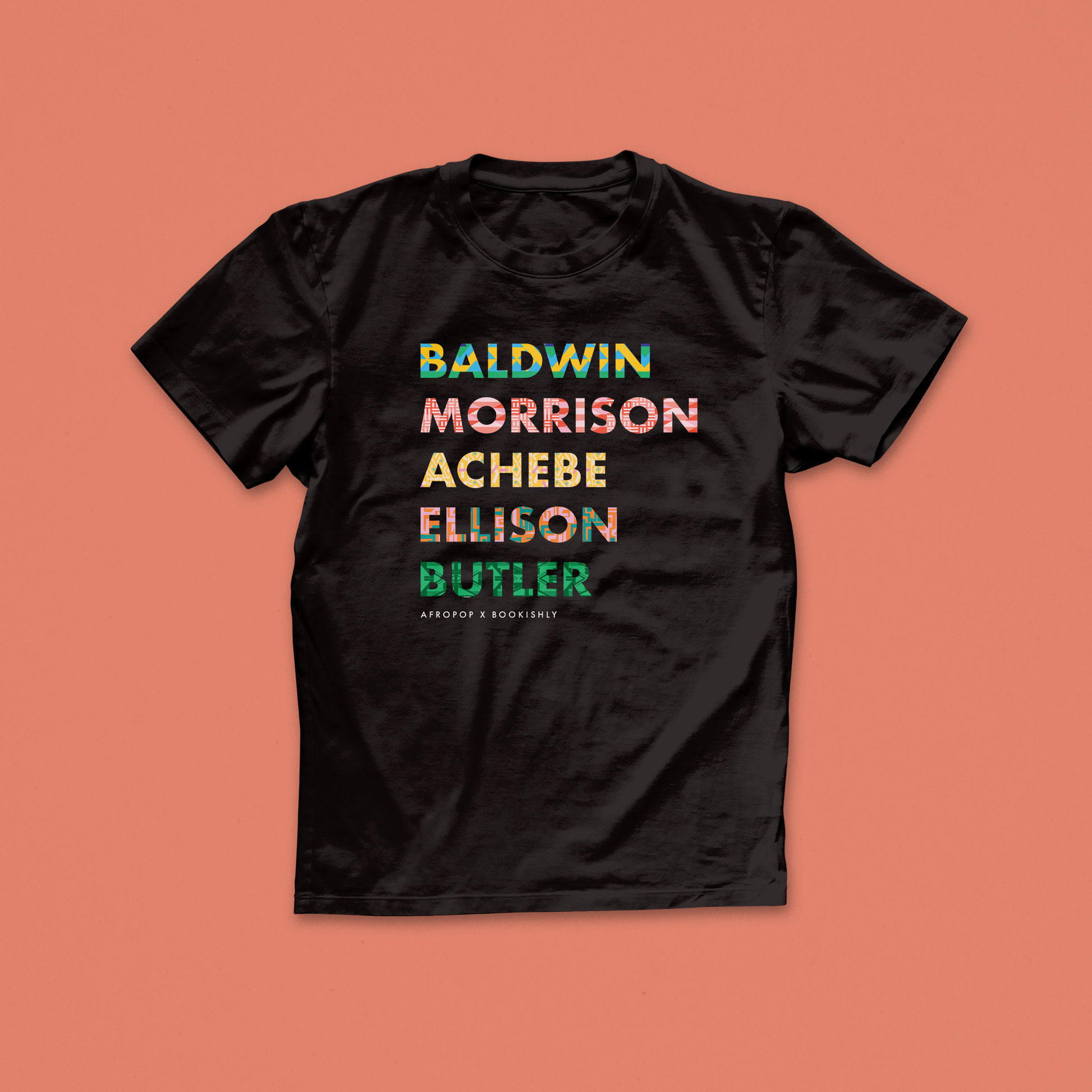 List of Black Authors t-shirt including 'Baldwin, Morrison, Achebe, Ellison, Butler'. Designed in collaboration with Afropop. Featuring block text with patterns inspired by African Heritage. Gifts for Book lover, bookworms, readers and bibliophiles. In support of black history month.