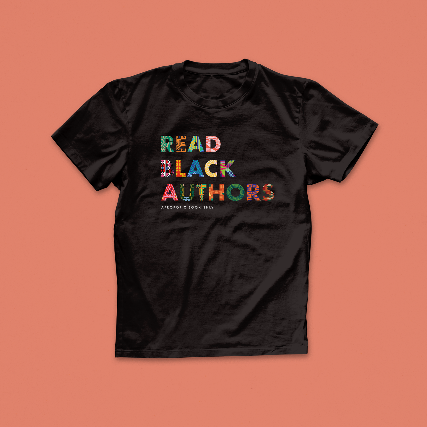 Read Black Authors t-shirt, designed in collaboration with Afropop. Featuring block text with patterns inspired by African Heritage. Gifts for Book lover, bookworms, readers and bibliophiles. In support of black history month.