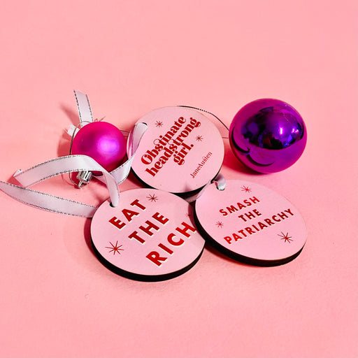 Bookish Christmas Tree decoration set of 3. Mix and Match available. Bright pink retro design. Colourful Christmas Tree Decor. Obstinate Headstrong Girl by Jane Austen. Perfect for book lovers, bookworms, bibliophiles and readers. Feminist festive hanging ornaments.