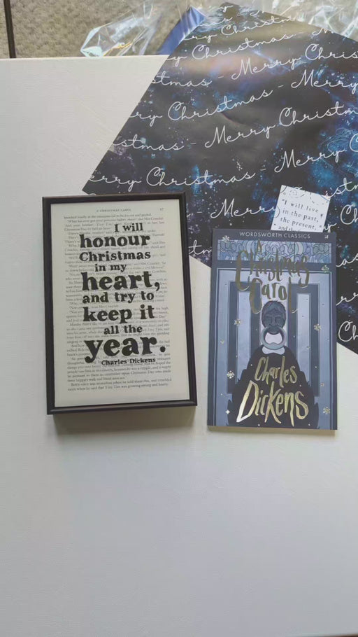 Christmas Carol by Charles Dickens and a Christmas themed Book Page Print with the quotes 'I will honour Christmas in my heart, and try to keep it all the year.' Perfect for book lovers, bookworms, readers and bibliophiles. Bookishly.